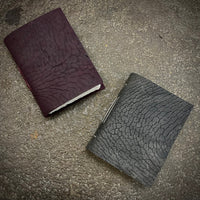 OB03 A6 notebook in grey horse culatta leather with hand cut raw paper