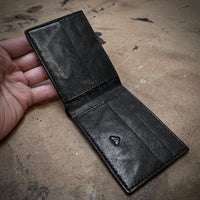 W01 bifold wallet in black horse shoulder leather with cash slot